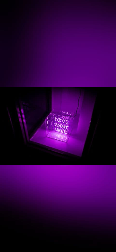 A neon lamp sculpture in a cube in a window. wallpaper in near-black and indigo tones, Full HD, 4:3 format for desktop