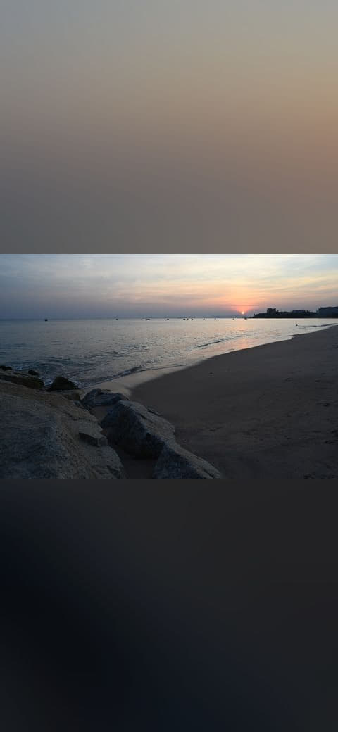 Sunset paints the quiet shoreline in soft pastels… wallpaper in charcoal and charcoal tones, Full HD, 4:3 format for phone
