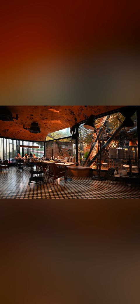DZ6 0547 A cozy stylish restaurant interior with… wallpaper in near-black and charcoal tones, Full HD, 4:3 format for phone