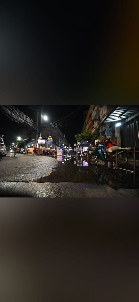 DZ6 0926 Two motorcyclists wait beside a puddle on… wallpaper in near-black and near-black tones, Full HD, 4:3 format for phone