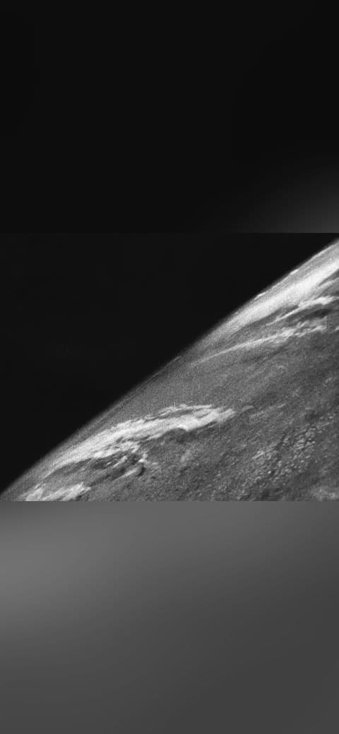 First photo from space wallpaper in near-black and olive tones, Full HD, 4:3 format for phone