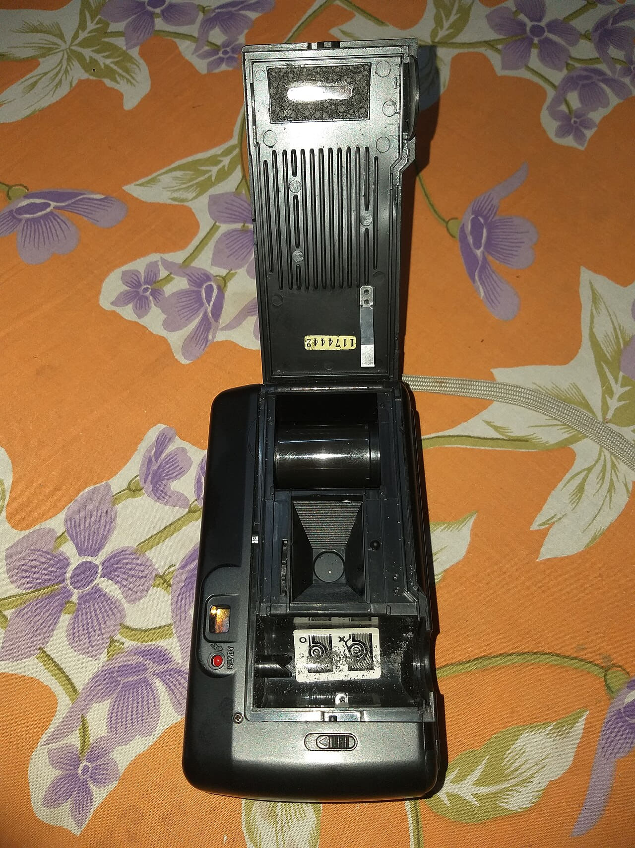 Inside view of a vintage film camera, 2023 wallpaper in burnt orange and near-black tones, Full HD, 3:4 format for phone